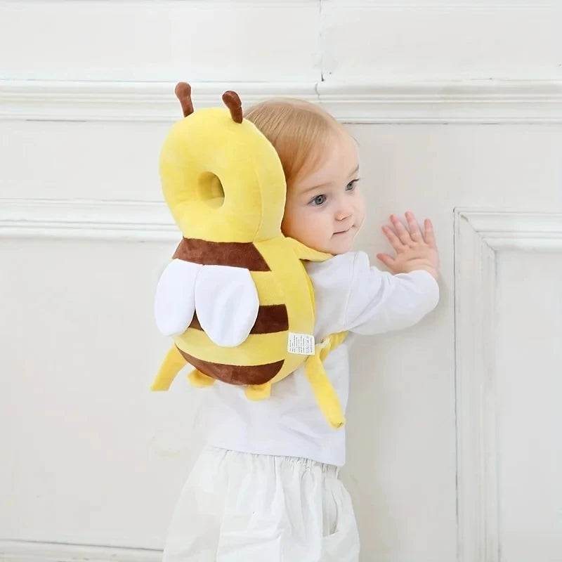 "Cute Protection for Every Tiny Adventure – a soft and lightweight head protector cushion designed to add comfort and cushioning while your little one learns to explore." 🧸💕👶